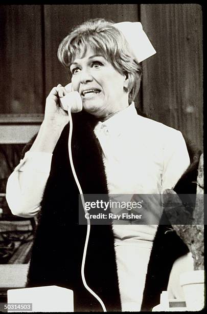 Actress Eve Arden talking on the telephone in a scene from the stage play Cactus Flower.