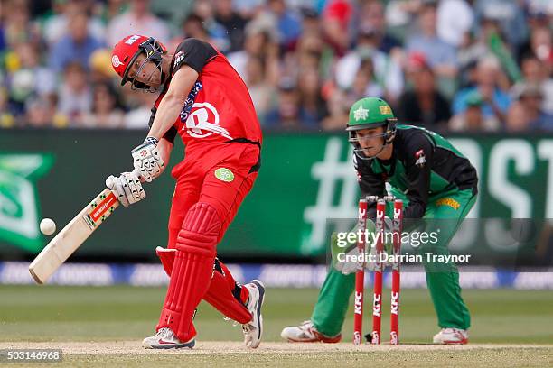 Cameron White of the Melbourne Renegades hits Adam Zampa of the Melbourne Stars for 6 during the Big Bash League match between the Melbourne Stars...