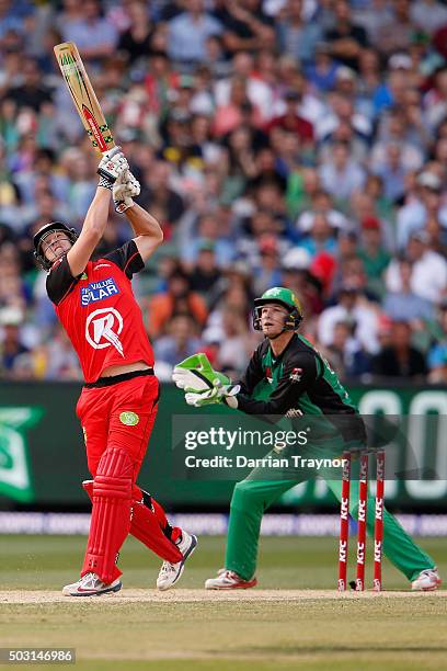 Cameron White of the Melbourne Renegades hits Adam Zampa of the Melbourne Stars for 6 during the Big Bash League match between the Melbourne Stars...