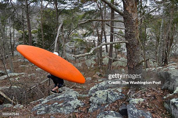 Aaron Mann makes his way to the Potomac River's Great Falls at the Chesapeake and Ohio Canal National Historical Park on Friday, January 1 in...