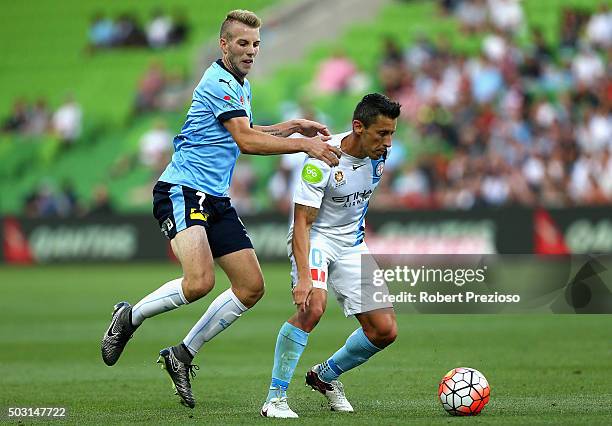 Andrew Hoole of Sydney and Robert Koren of Melbourne City contest the ball during the round 13 A-League match between Melbourne City FC and Sydney FC...
