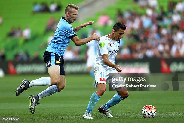 Andrew Hoole of Sydney and Robert Koren of Melbourne City contest the ball during the round 13 A-League match between Melbourne City FC and Sydney FC...