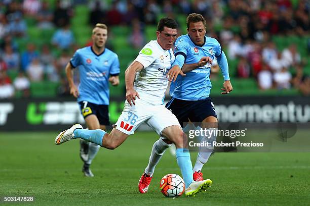 Matthew Millar of Melbourne City and Alexander Gersbach of Sydney contest the ball during the round 13 A-League match between Melbourne City FC and...