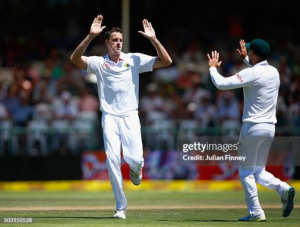 Morne Morkel of South Africa celebrates taking the wicket of Alex Hales of England after he was caught behind by AB de Villiers of South Africa...