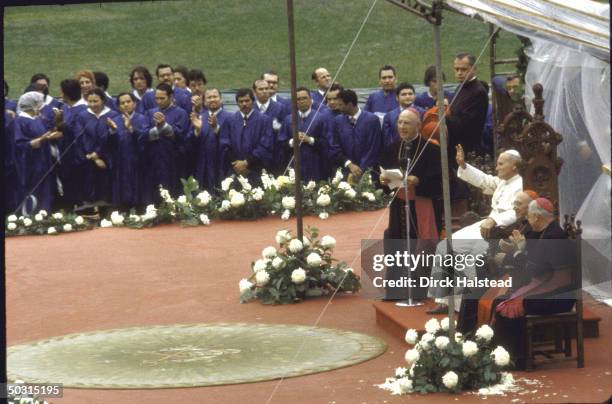 Pope John Paul II seated on platform at Shea stadium delivering his farewell address, New York, New York, October 3, 1979.