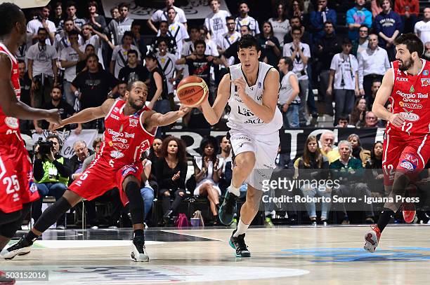 Simone Fontecchio of Obiettivo Lavoro competes with Preston Knowles and Ariel Filloy of Giorgio Tesi Group during the match of LegaBasket between...