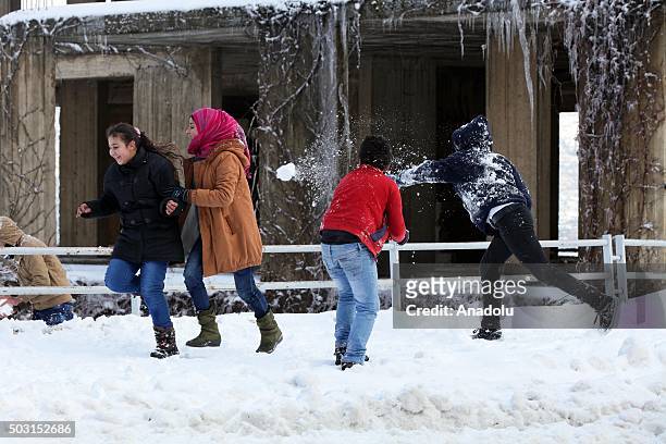 People play snowball at Bhamdoun town in Beirut, Lebanon on January 2, 2016.