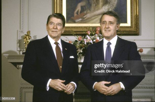 President Ronald W. Reagan posing with Canadian Prime Minister Brian Mulroney before talks in Ottowa, April 1987.