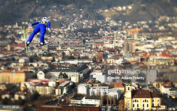 Junshiro Kobayashi of Japan soars over Innsbruck during his qualification jump on Day 1 of the Innsbruck Four Hills Tournament on January 2, 2016 in...