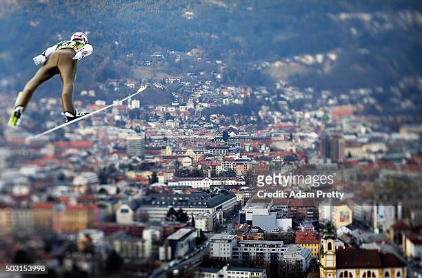 Severin Freund of Germany soars over Innsbruck during his qualification jump on Day 1 of the Innsbruck Four Hills Tournament on January 2, 2016 in...