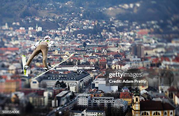 Severin Freund of Germany soars over Innsbruck during his qualification jump on Day 1 of the Innsbruck Four Hills Tournament on January 2, 2016 in...