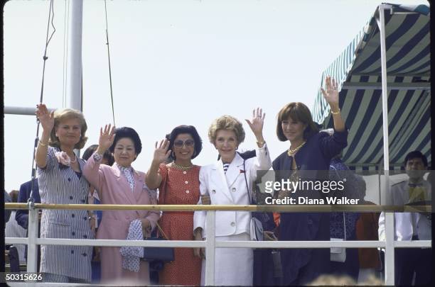 Nancy Reagan , Hannelore Kohn , Mila Mulroney , Anna de Mita and Naoko Takeshita taking a boat cruise while husbands attend economic summit.