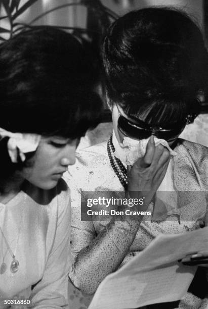 Ngo Dinh Le Thuy and her mother Madame Ngo Dinh Nhu sitting in Beverly Wilshire Hotel shortly after learning of revolt in Vietnam.