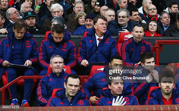 Louis van Gaal Manager and assistant manager Ryan Giggs are seen on the bench prior to the Barclays Premier League match between Manchester United...