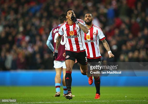 Patrick van Aanholt of Sunderland celebrates scoring his team's first goal during the Barclays Premier League match between Sunderland and Aston...