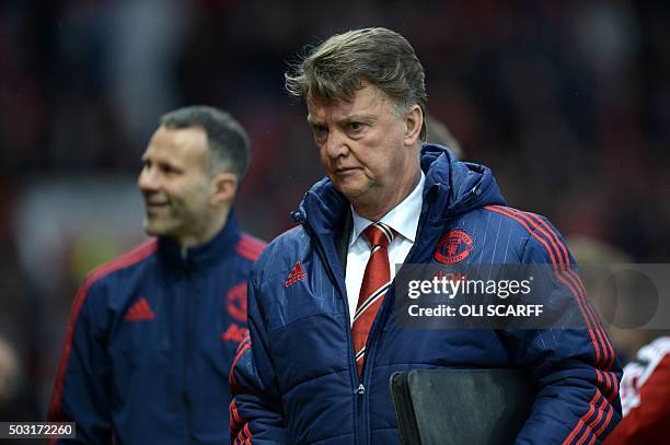 Manchester United's Dutch manager Louis van Gaal arrives ahead of the English Premier League football match between Manchester United and Swansea...