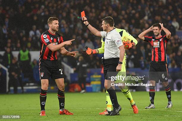 Simon Francis of Bournemouth is shown a red card by referee Andre Marriner after fouling on Jamie Vardy of Leicester City during the Barclays Premier...