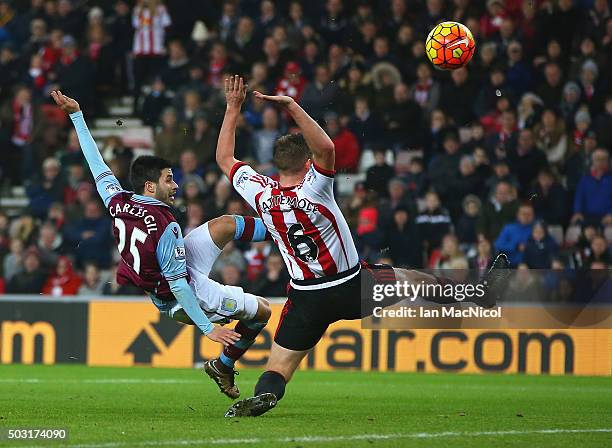 Carles Gil of Aston Villa scores his team's first goal during the Barclays Premier League match between Sunderland and Aston Villa at Stadium of...