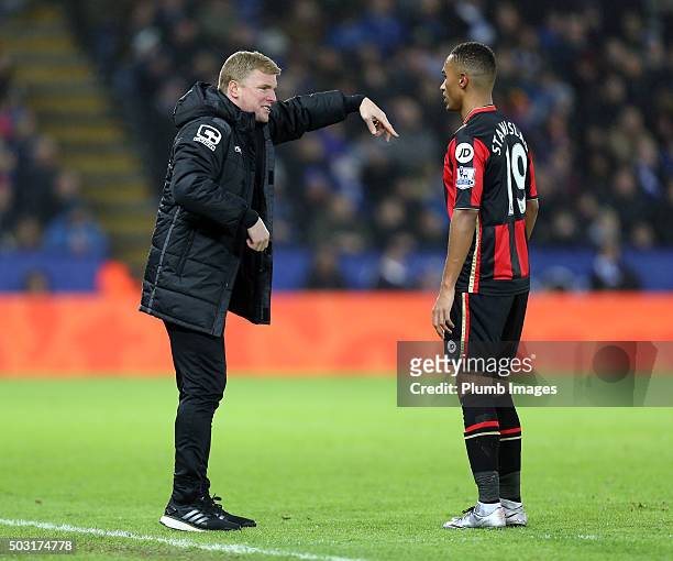 Manager Eddie Howe of Bournemouth gives instructions to Junior Stanislas of Bournemouth during the Barclays Premier League match between Leicester...