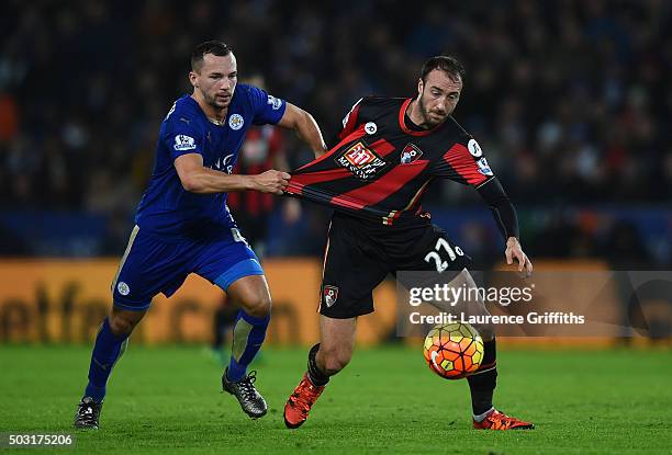 Glenn Murray of Bournemouth and Danny Drinkwater of Leicester City compete for the ball during the Barclays Premier League match between Leicester...