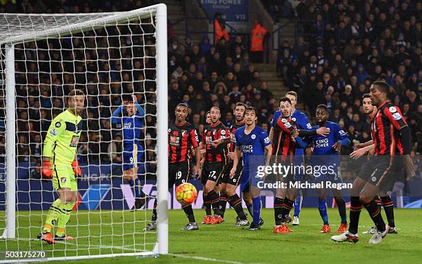 Players watch the ball going wide during the Barclays Premier League match between Leicester City and Bournemouth at The King Power Stadium on...