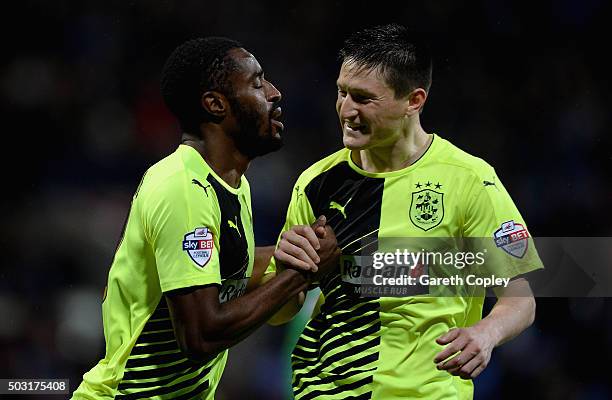 Mustapha Carayol of Huddersfield Town celebrates scoring his team's second goal with Joe Lolley during the Sky Bet Championship match between Bolton...