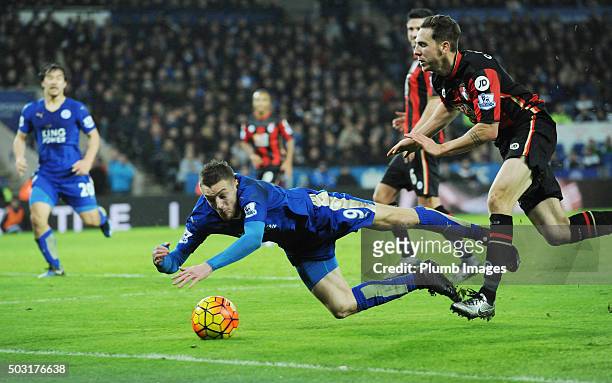 Jamie Vardy of Leicester City is brought down in the box by Simon Francis of Bournemouth during the Barclays Premier League match between Leicester...