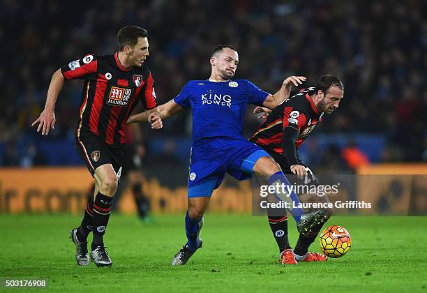 Glenn Murray of Bournemouth and Danny Drinkwater of Leicester City compete for the ball during the Barclays Premier League match between Leicester...