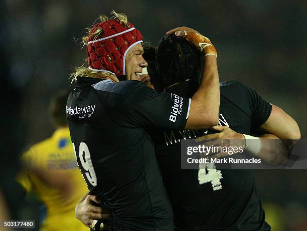 Will Welch , Mark Wilson and Mouritz Botha of Newcastle Falcons celebrate at the final whistle as their side won 19-14 over Bath Rugby during the...