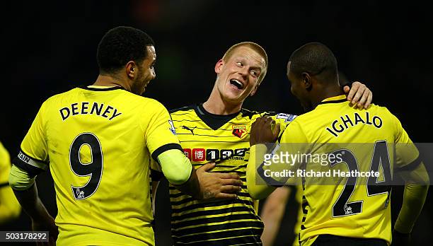 Ben Watson of Watford celebrates with Troy Deeney of Watford and Odion Ighalo of Watford after scoring his side's first goal during the Barclays...