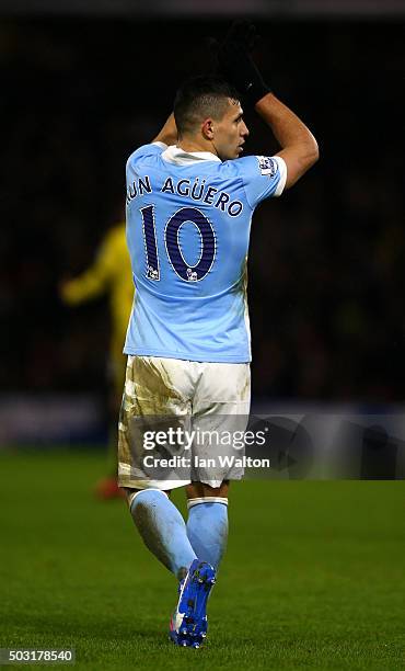 Sergio Aguero of Manchester City celebrates scoring his side's second goal during the Barclays Premier League match between Watford and Manchester...
