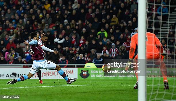 Sunderland striker Jermaine Defoe shoots to score the second Sunderland goal during the Barclays Premier League match between Sunderland and Aston...