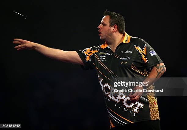 Adrian Lewis of England in action during his semi-final match against Raymond van Barneveld of The Netherlands during the 2016 William Hill PDC World...