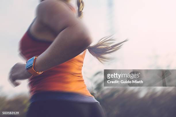 woman running outdoor. - correre foto e immagini stock