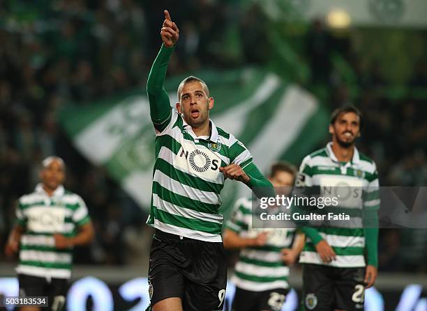 Sporting CP's forward Islam Slimani celebrates after scoring a goal during the Primeira Liga match between Sporting CP and FC Porto at Estadio Jose...