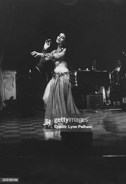 Egyptian twin belly dancing at the Eden Roc night club.