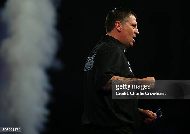 Gary Anderson of Scotland celebrates winning his semi-final match against Jelle Klaasen of Holland during the 2016 William Hill PDC World Darts...