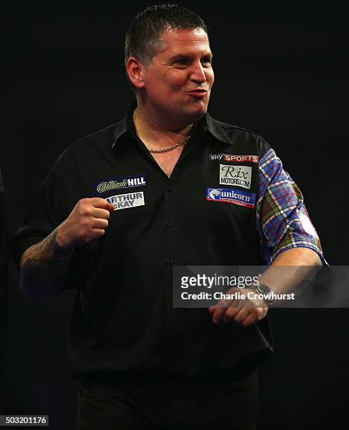 Gary Anderson of Scotland celebrates winning his semi-final match against Jelle Klaasen of Holland during the 2016 William Hill PDC World Darts...
