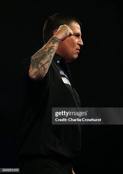 Gary Anderson of Scotland celebrates winning his semi-final match against Jelle Klaasen of Holland during the 2016 William Hill PDC World Darts...