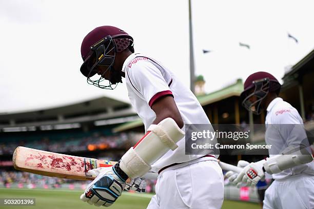 Kraigg Brathwaite of West Indies heads out to bat with team mate Shai Hope of West Indies during day one of the third Test match between Australia...