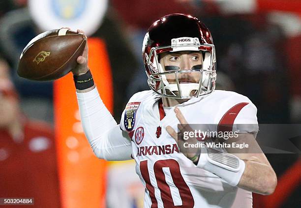Arkansas quarterback Brandon Allen puts the ball in the air