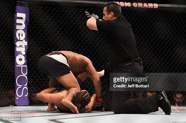 Brian Ortega submits Diego Brandao of Brazil in their featherweight bout during the UFC 195 event inside MGM Grand Garden Arena on January 2, 2016 in...