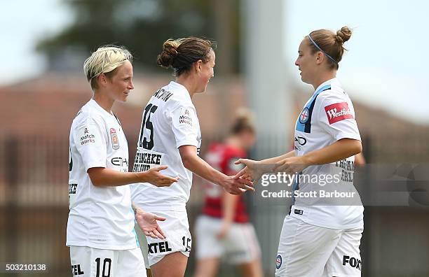 Marianna Tabain of City FC celebrates with Jessica Fishlock and Amy Jackson after scoring the fourth goal during the round 12 W-League match between...