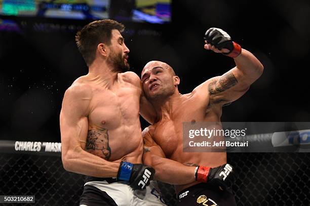 Robbie Lawler punches Carlos Condit in their UFC welterweight championship bout during the UFC 195 event inside MGM Grand Garden Arena on January 2,...