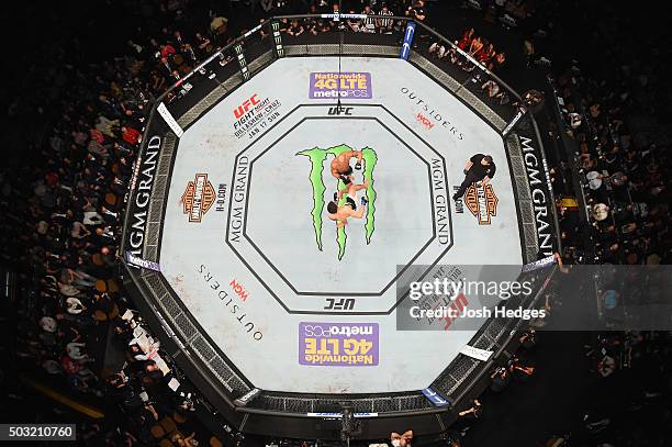 An overhead view of the Octagon as Carlos Condit kicks Robbie Lawler during the UFC 195 event inside MGM Grand Garden Arena on January 2, 2016 in Las...