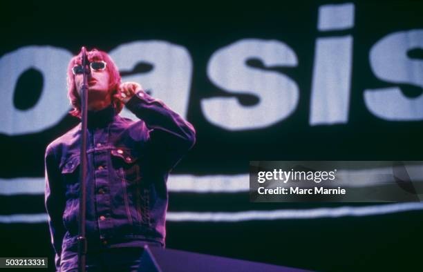 Singer Liam Gallagher performing with British rock band Oasis, UK, August 1996.