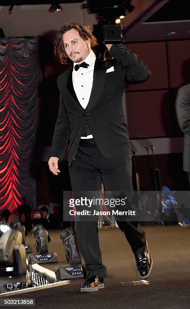 Actor Johnny Depp accepts the Desert Palm Achievement Award onstage at the 27th Annual Palm Springs International Film Festival Awards Gala at Palm...