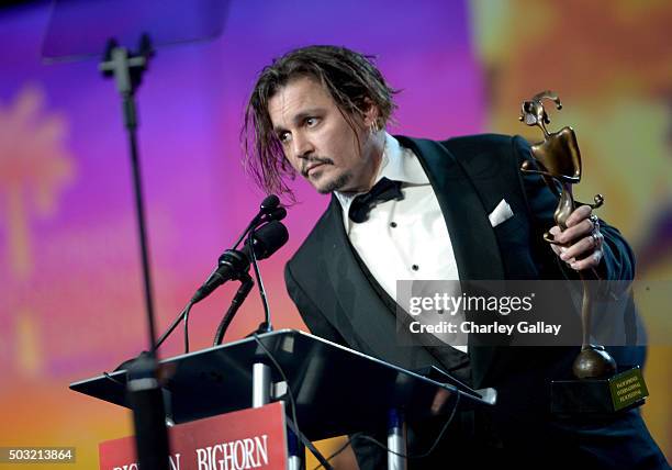 Actor Johnny Depp accepts the Desert Palm Achievement Award onstage at the 27th Annual Palm Springs International Film Festival Awards Gala at Palm...