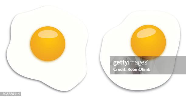 two fried eggs - fried egg stock illustrations