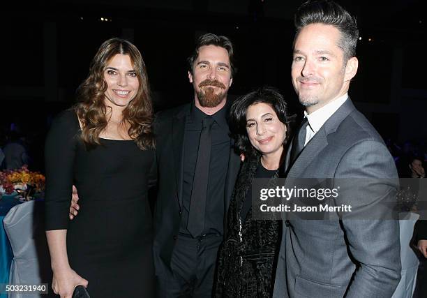 Sibi Blazic, actor Christian Bale, President, Worldwide Marketing and Distribution for Warner Bros. Sue Kroll and director Scott Cooper attend the...